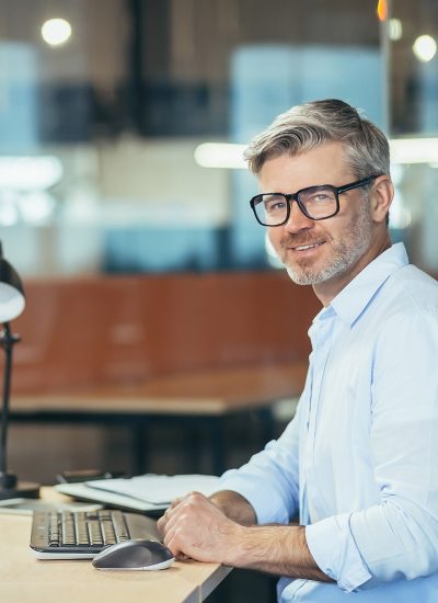 portrait-of-an-experienced-male-accountant-busine-2022-12-08-04-11-40-utc
